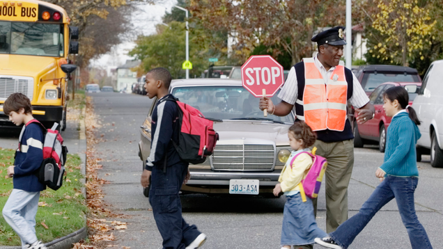 Illustration for article titled 8 Local Crossing Guards I’ve Got Wrapped Around My Little Finger